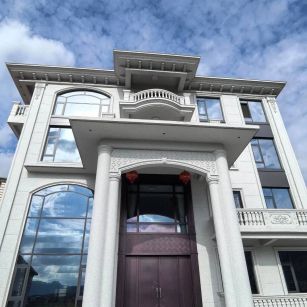 张家界白麻别墅外墙干挂石材效果示例