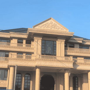 张家界黄金麻别墅外墙干挂石材效果示例