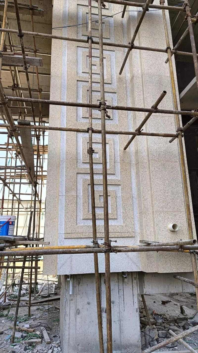 张家界 黄金麻花岗岩别墅外墙干挂回纹造型效果