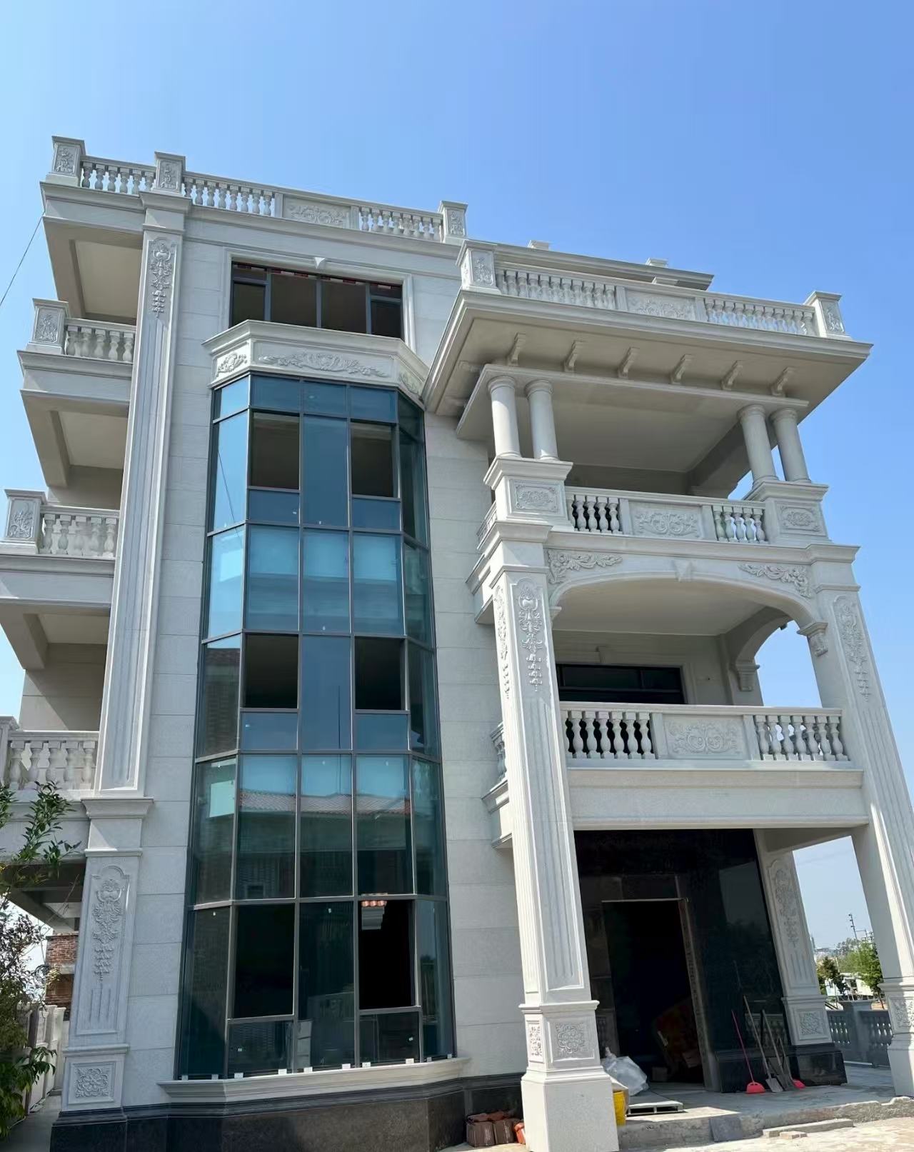 张家界 白麻花岗岩别墅外墙干挂效果展示